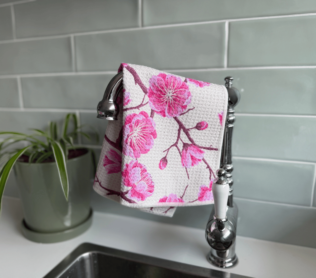 DirtyGirl Blossom Bloom Cloth draped over sink tap β Absorbent weave for spills